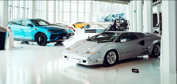 Enzo Ferrari speaks with reporters during the weekend of the 1967 Italian Grand Prix