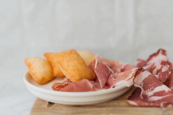 Modena – Traditional food- Gnocco Fritto with Ham and Salami