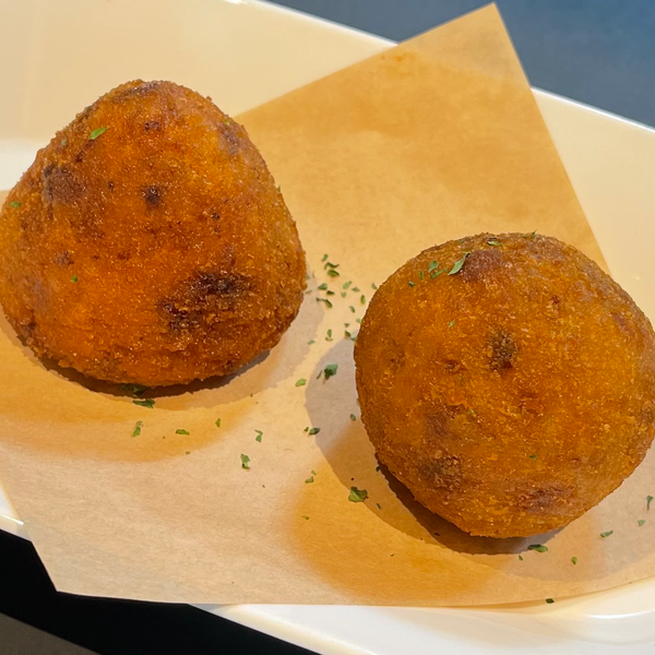 Sicilian Arancini, or rice balls, are one of the most recognized Sicilian foods in the world