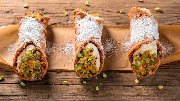 ​Cannoli siciliani - crispy fried pastry tubes filled with luscious ricotta cheese cream​