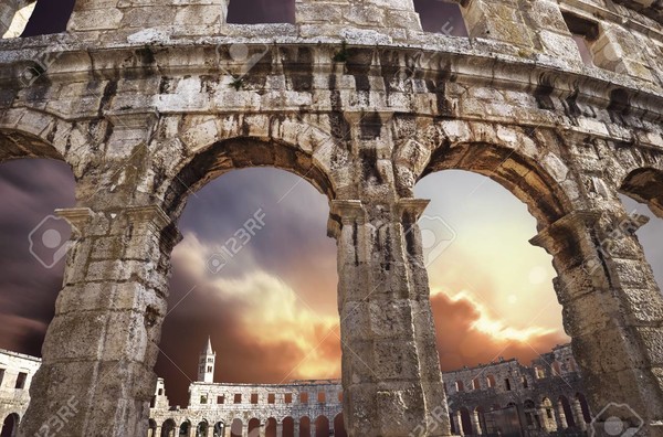 ARENA PULA -famous-croatian-city-pula-old-amphitheater-arches-with-sunset-sky
