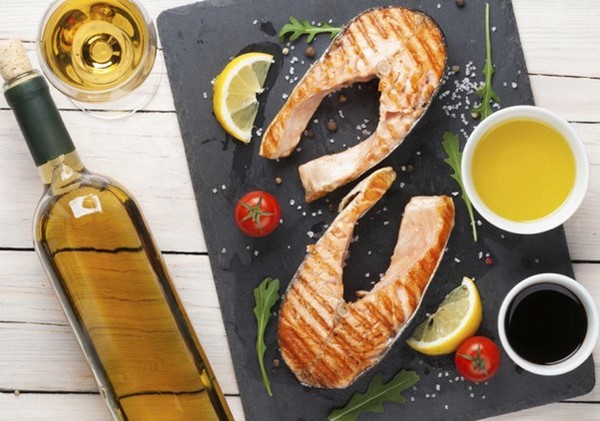Lacryma Christi white wine with grilled fish. Photo Credits: www.feudiguagnano.it (winery).