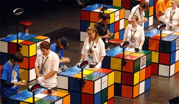 Players compete in solving Rubik's cubes during the final of the 2007 Rubik's Cube World Championships in Budapest, Hungary, Source: AP / Bela Szandelszky