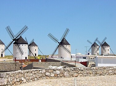 La Mancha’s traditional windmills, still standing in the town of Campo de Criptana, close to the city of Cuenca, Castilla-La Mancha autonomous region, were immortalized in the novel Don Quixote. Photo Credits: CC BY-SA 3.0 www.wikipedia.org