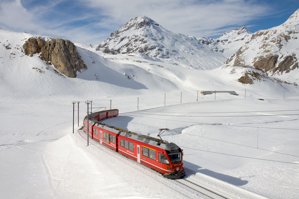 "Allegra" multiple unit with a local train to Tirano in the grade between Bernina Lagalb and Ospizio Bernina on Alp